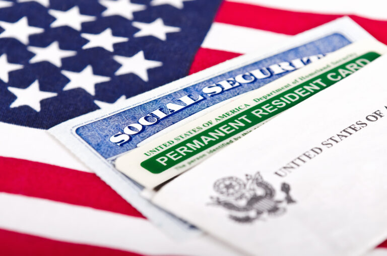 Social security card laying on a flag Place Permanent Labor Certification Advertising