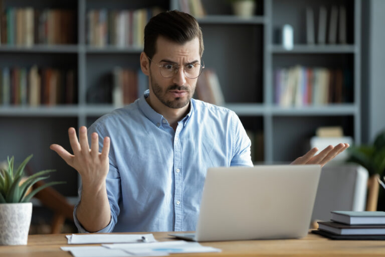 person at a laptop looking confused at how to place a public notice