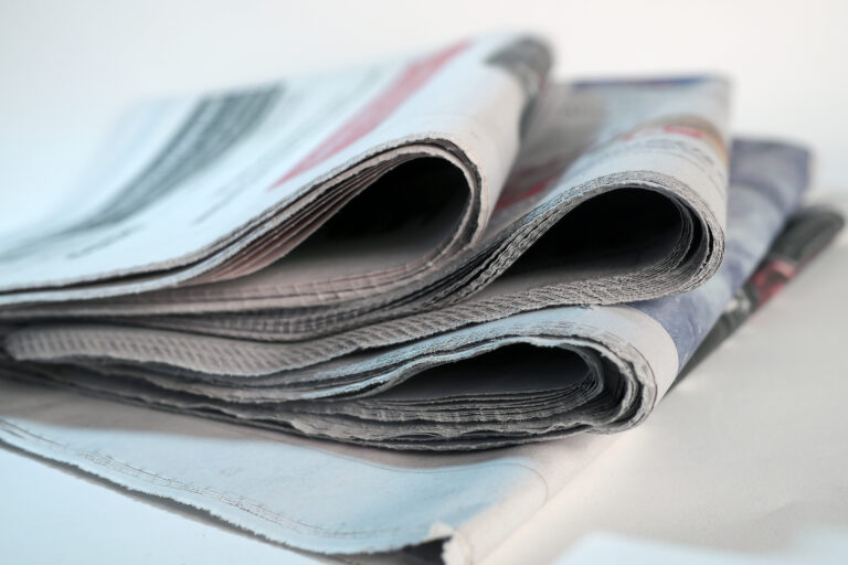 stack of Arizona Business Gazette Newspapers a local newspaper in Phoenix